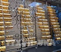 Đồng USD mạnh lên gây áp lực lên giá vàng