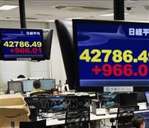 Chứng khoán châu Á phản ứng tích cực khi Chính phủ Mỹ nối lại hoạt động