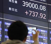 Chứng khoán châu Á theo chân đà tăng kỷ lục trên Phố Wall