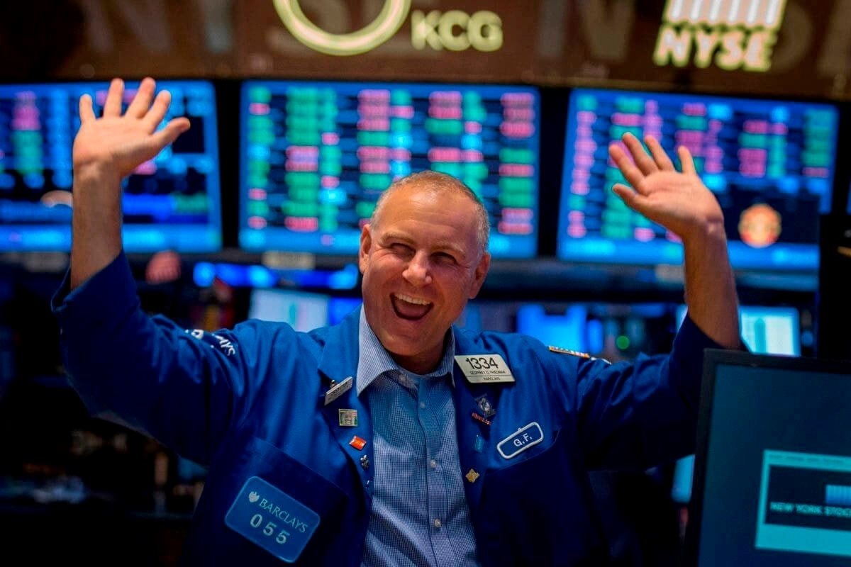 stock market trader happy reuters 1
