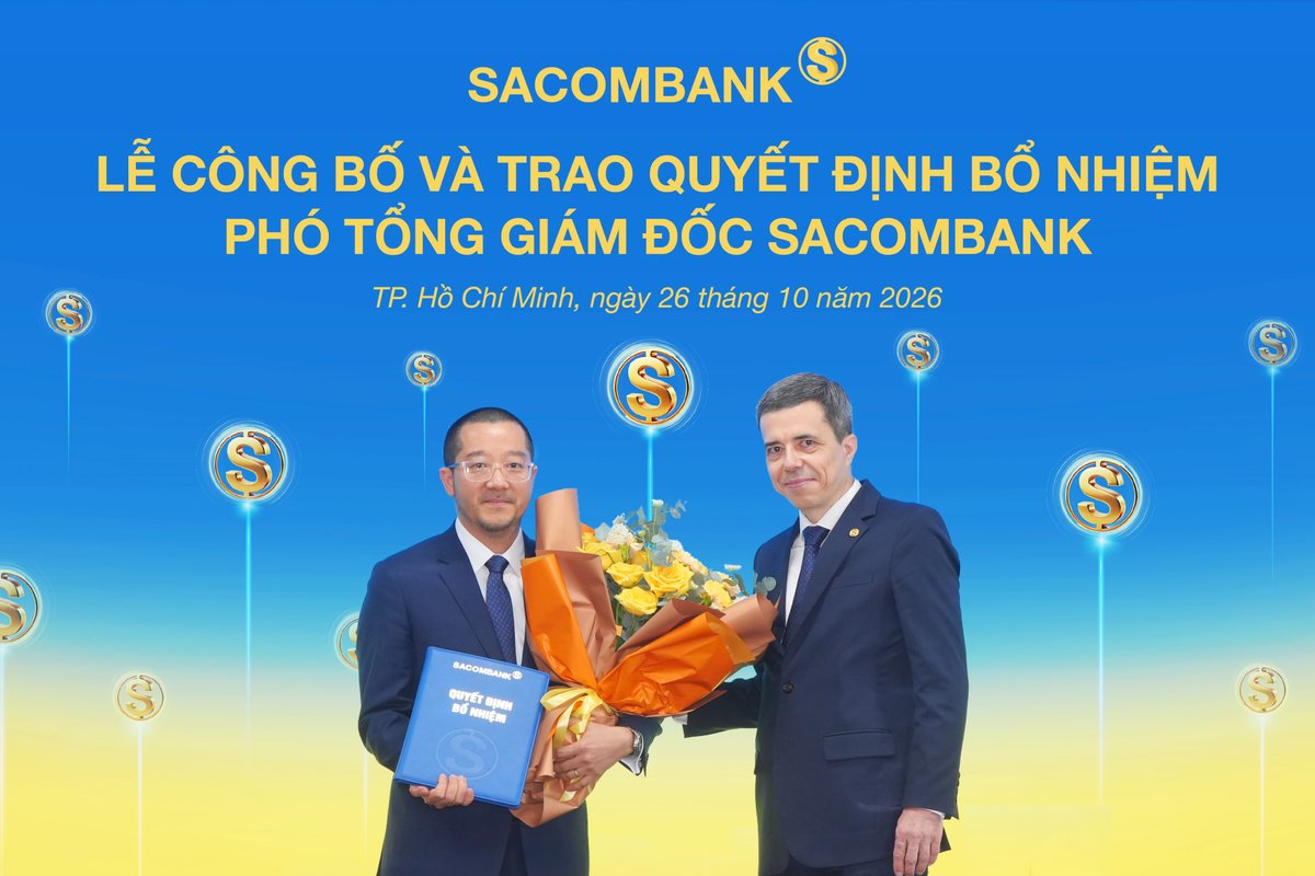 Ông Nguyễn Xuân Ái Quốc nhận quyết định bổ nhiệm và hoa chúc mừng từ ông Loic Faussier - Tổng giám đốc SACOMBANK Ông Nguyễn Xuân Ái Quốc nhận quyết định bổ nhiệm và hoa chúc mừng từ ông Loic Faussier - Tổng giám đốc SACOMBANK